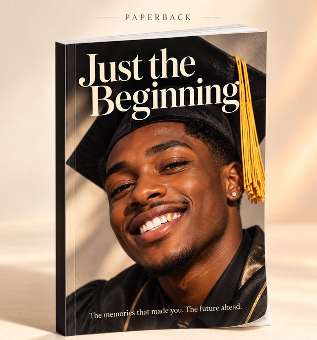 A paperback keepsake book titled Just the Beginning, with a full-cover photograph of a smiling graduate in cap and gown